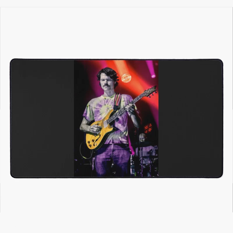 Guitarist Performing on Colorfully Lit Concert Stage Desk Mat